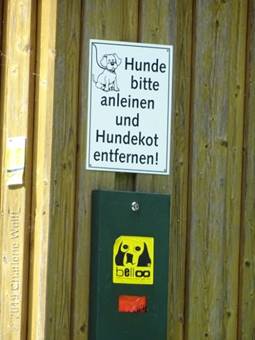 Hundekot von Hunden entfernen