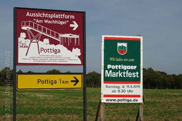 Ortsschild Pottiga, Aussichtsplattform und Marktfest